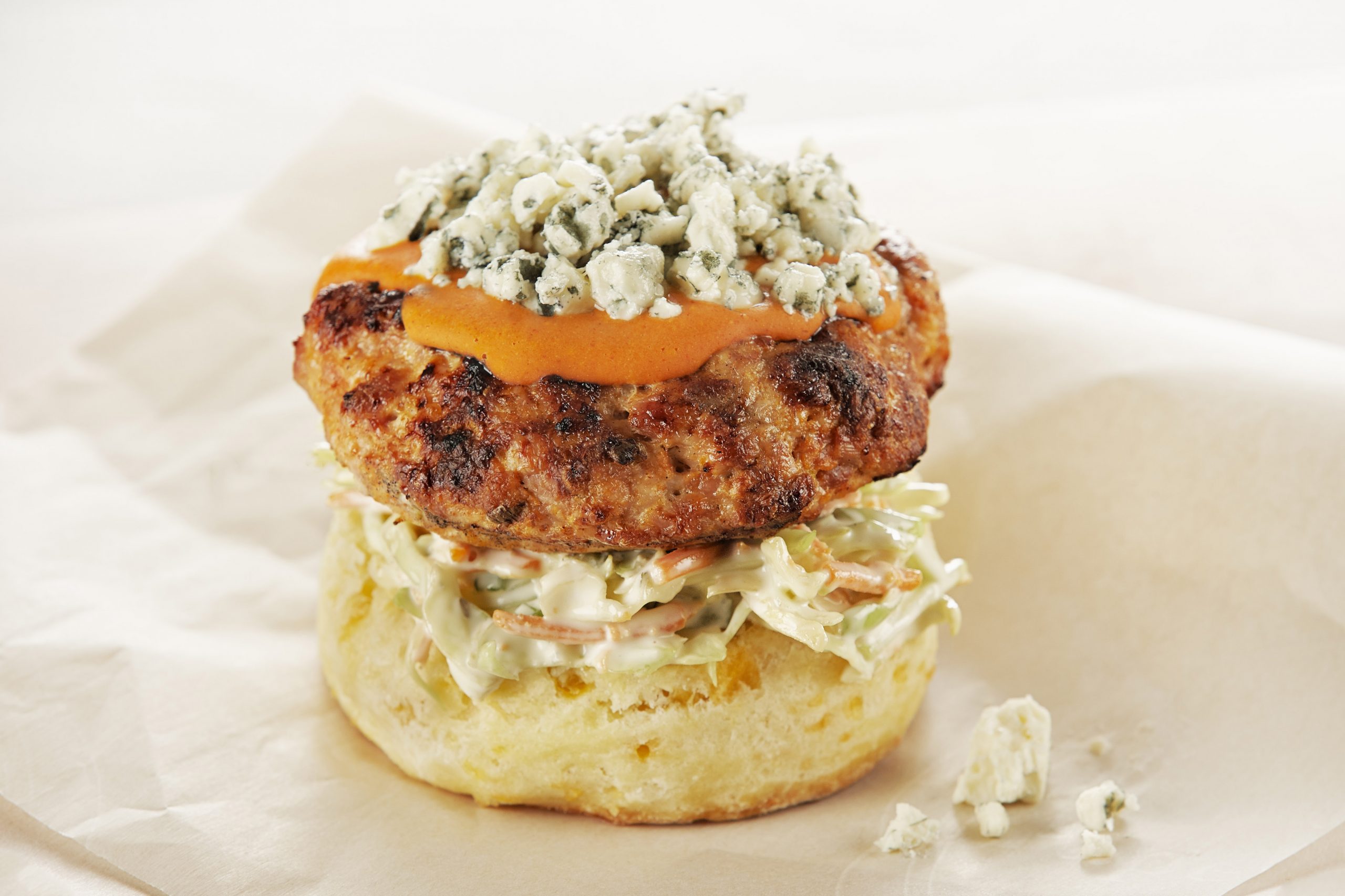 BUFFALO CHICKEN BURGERS WITH BLUE CHEESE SLAW