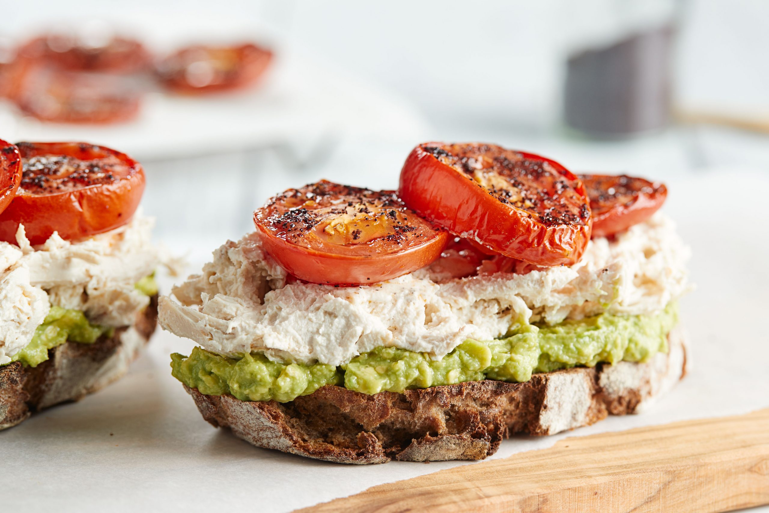 CHICKEN TOASTS WITH AVOCADO & TOMATO